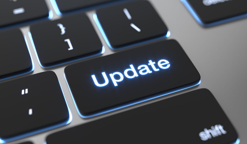 Gros plan sur une touche de clavier avec le mot "Update"